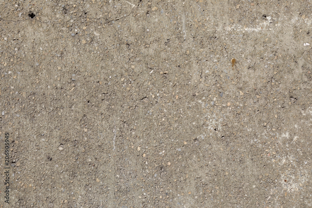 Gray spotted a concrete wall, background, texture Gray spotted a concrete wall, background, texture