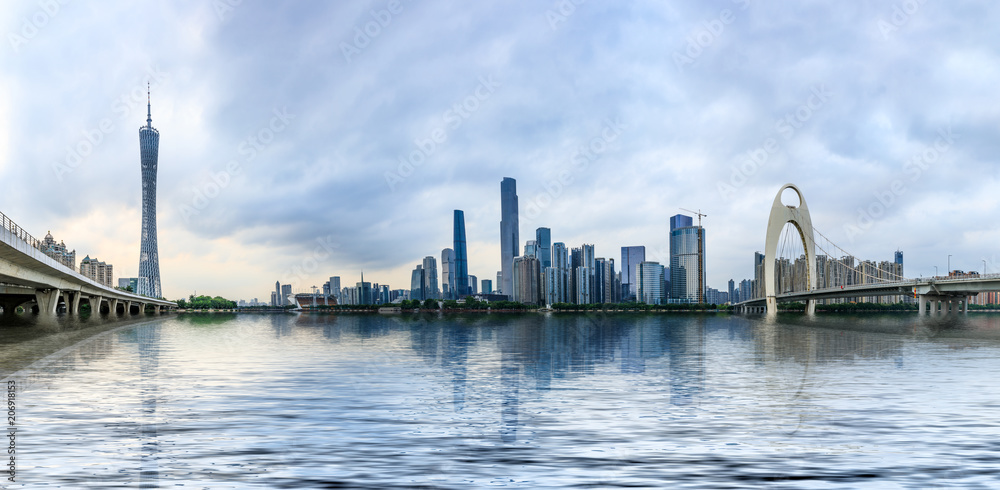 Guangzhou,China modern city skyline on the zhujiang river at dusk Guangzhou,China modern city skyline on the zhujiang river at dusk