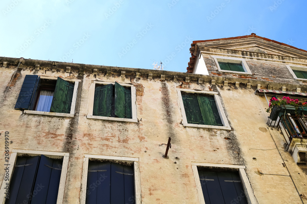 Historic architecture with old medieval buildings in Venice, Italy, Europe.