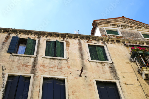 Historic architecture with old medieval buildings in Venice, Italy, Europe.
