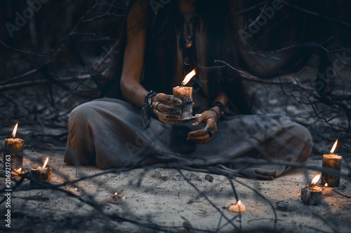 woman hands holding candle close up photo