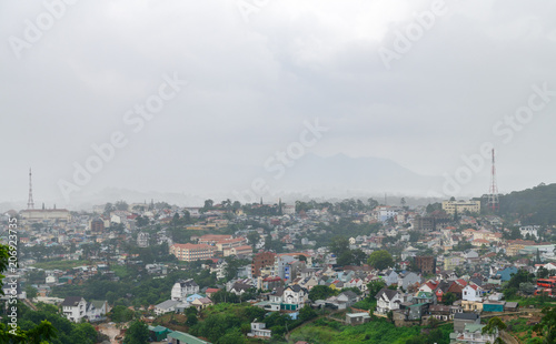 Cityscape of Da Lat, vietnam with fog in rainy