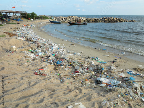 gabage and plastic from the sea to make pollution and dirty beach
