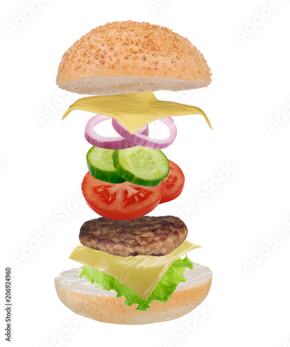 ingredients of bureger fall on bun photo