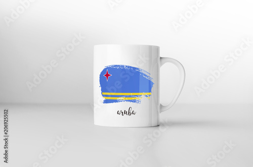 Aruba flag souvenir mug on white background. 3D rendering.