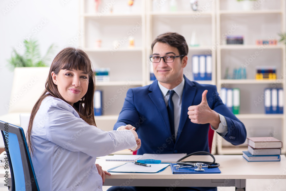 Man signing medical insurance contract Man signing medical insurance contract