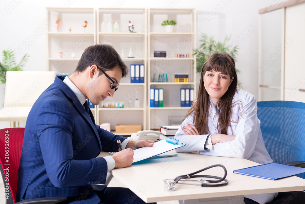 Man signing medical insurance contract Man signing medical insurance contract
