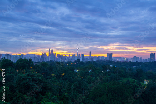 Canvas Print Majestic sunrise over KL Tower and surrounded buildings in downtown Kuala Lumpur, Malaysia