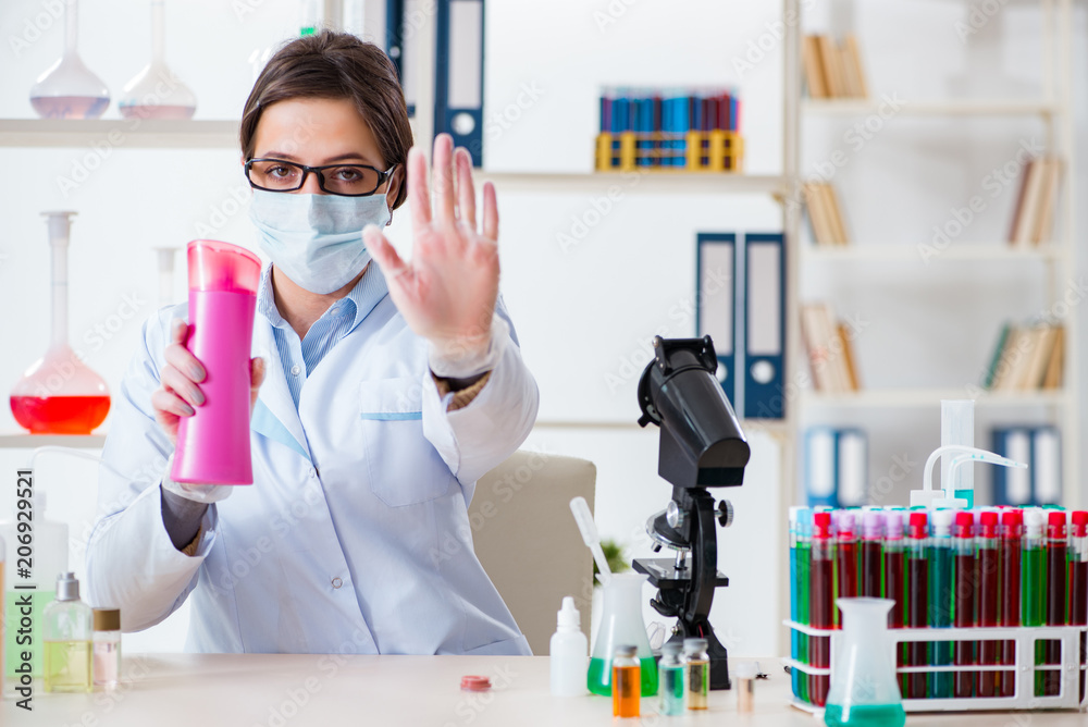 Lab chemist checking beauty and make-up products Lab chemist checking beauty and make-up products