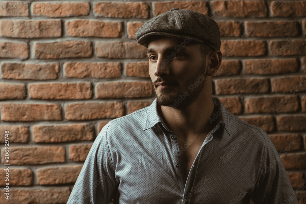 handsome man in a cap handsome man in a cap