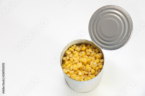 Close up of a corn can in a white background photo