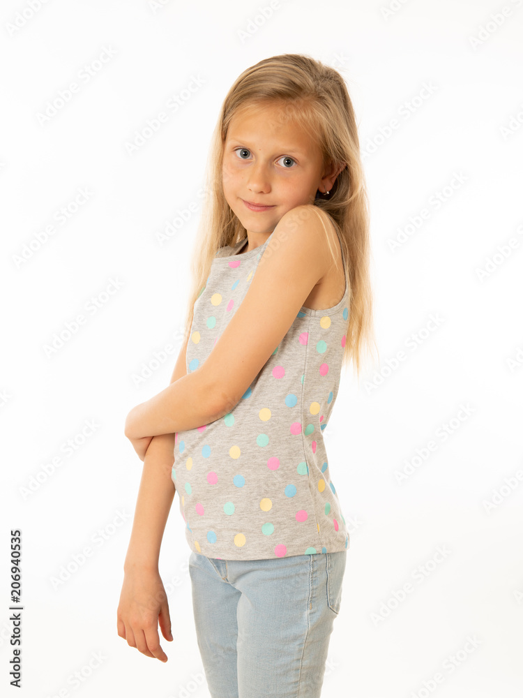 Cute blonde girl looking shy and timid at the camera on a white background. Human emotions Cute blonde girl looking shy and timid at the camera on a white background. Human emotions
