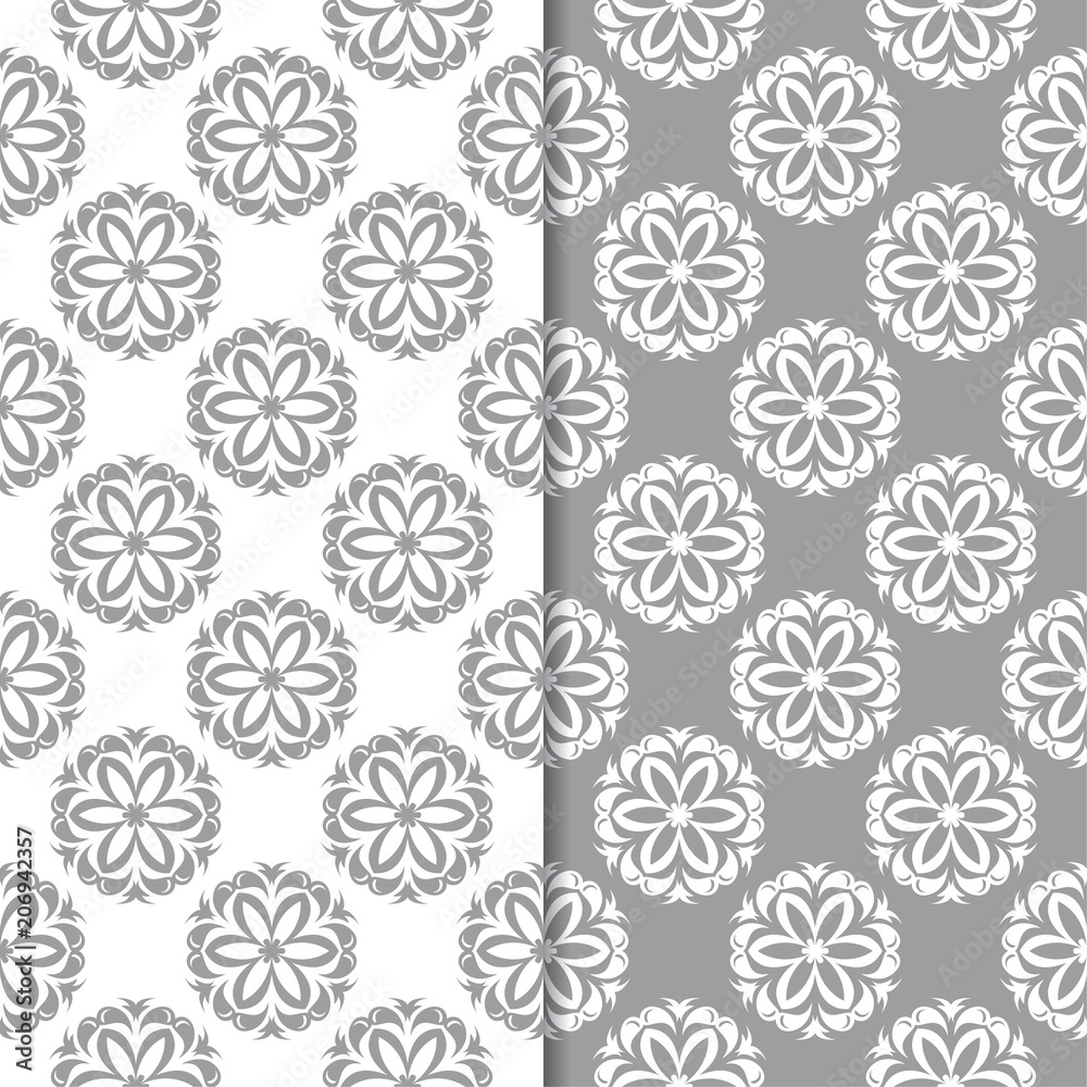 White and gray floral backgrounds. Set of seamless patterns White and gray floral backgrounds. Set of seamless patterns