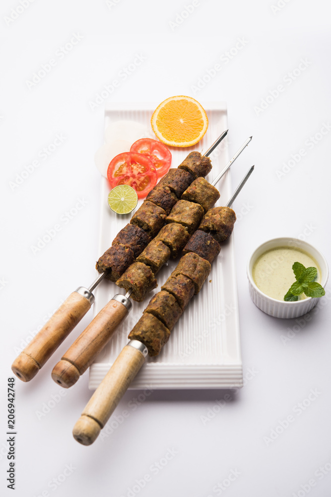 Veg Seekh Kabab served with green salad and chutney Veg Seekh Kabab served with green salad and chutney
