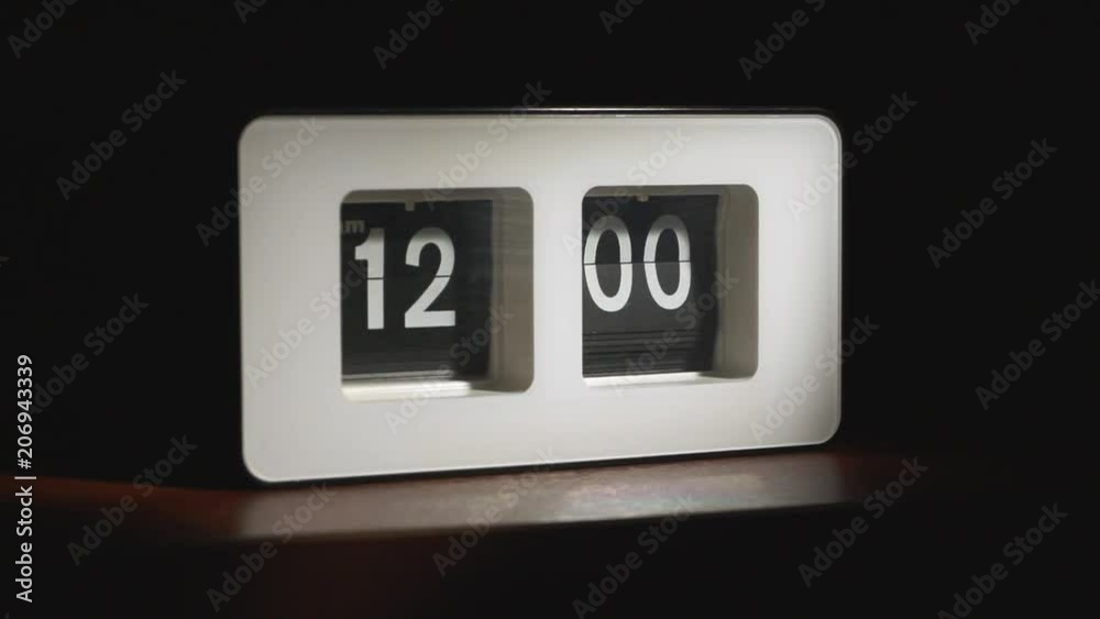 Flip clock mechanism. 12-00 AM. Super slow motion 240 fps. Flip clock mechanism. 12-00 AM. Super slow motion 240 fps.