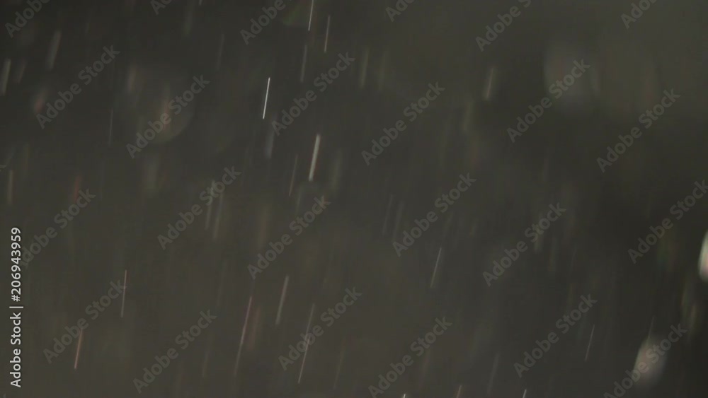 Real falling dust particles out of focus in front of a very high intensity sunlight.