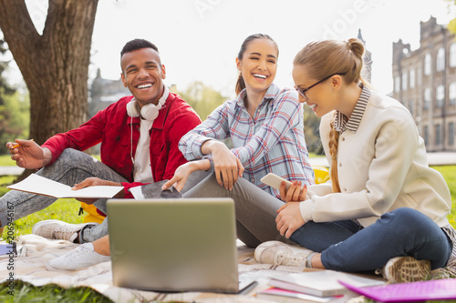 Canvas Print Laughing graduates