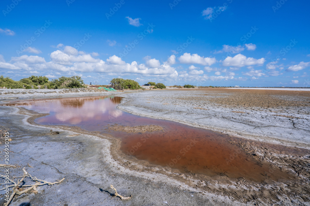 Abandoned salt beach with incredible beautiful iron red color bittern
