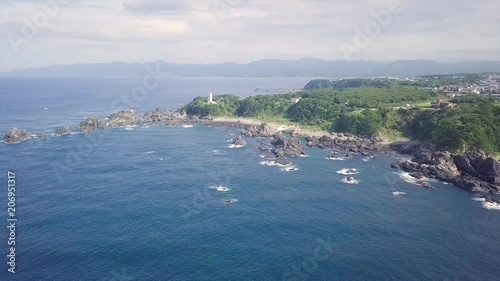 Aerial, Kushimoto coastline, lighthouse and camping ground from the air in Wakayama prefecture in Japan. photo