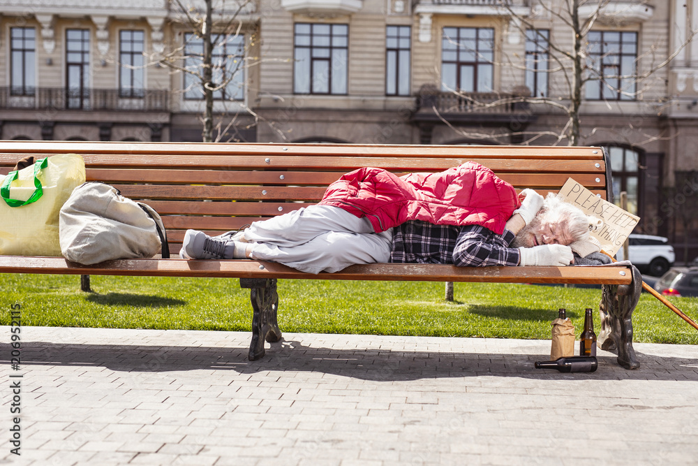 © Viacheslav Yakobchuk - Street people. Aged homeless man living on the street while not having a place to live