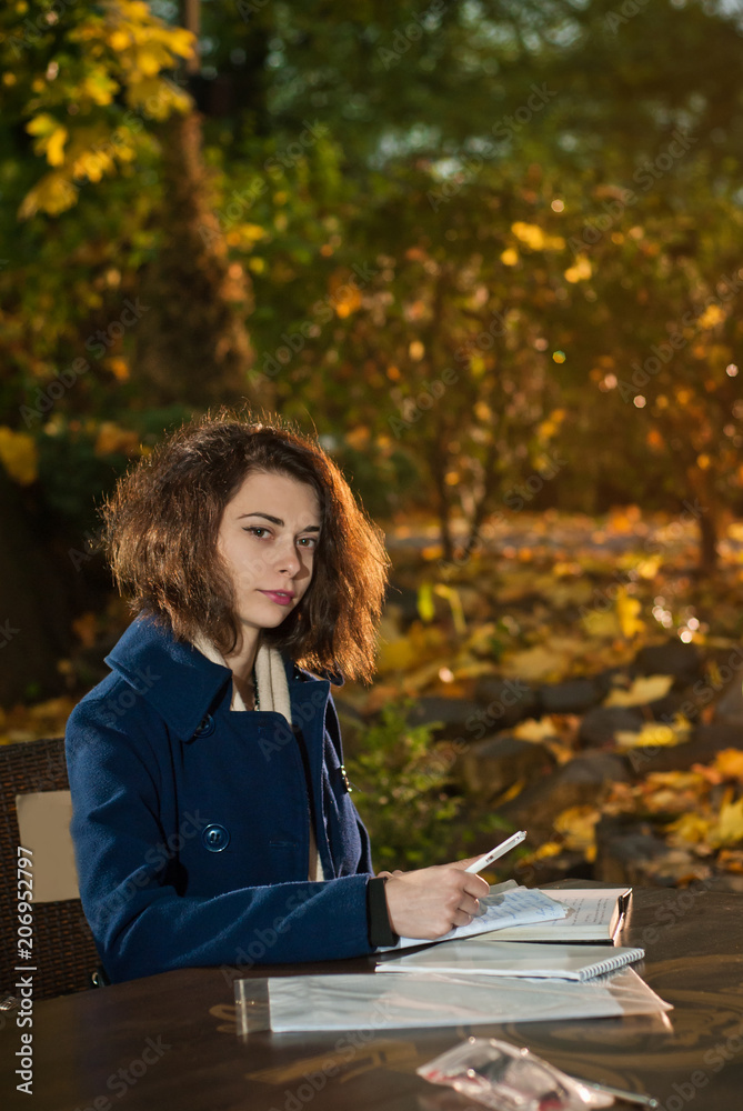 the girl at the cafe at the table the girl at the cafe at the table