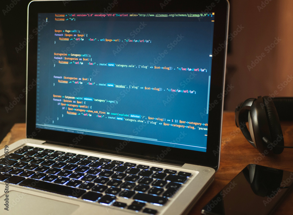 Computer code on laptop (web developing) Computer code on laptop (web developing)