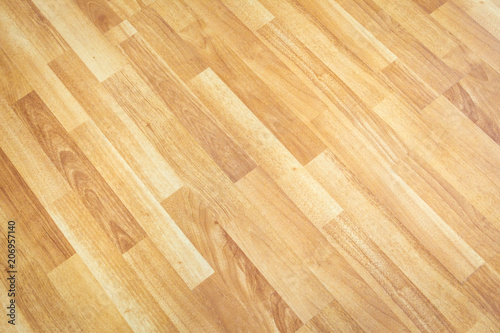 Luxury laminate wood floor from top angle view showing the beautiful wood detail. © DG PhotoStock