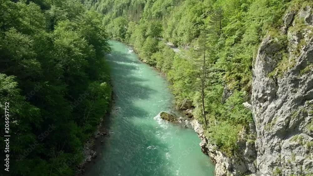 Turquoise river in mountain gorge aerial Turquoise river in mountain gorge aerial