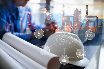 Double exposure of Engineer with oil refinery industry plant background, industrial instruments in the factory and physical system icons concept, Industry 4.0 concept image