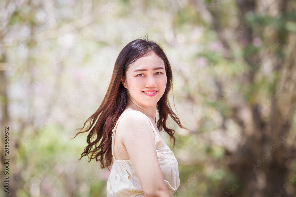 Portrait of the Asian women close up half body on nature bokeh background. Portrait of the Asian women close up half body on nature bokeh background.