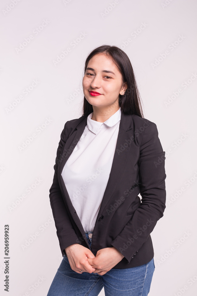 Young Asian student woman isolated on white background. Young Asian student woman isolated on white background.