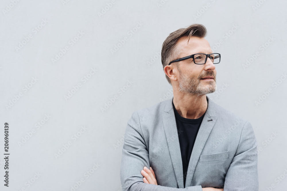 Mature man with glasses wearing grey jacket - obrazy, fototapety, plakaty 