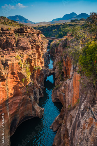 A portrait/vertical shot of the gorge at Bourke’s Luck Potholes in Mpumalanga, South Africa; a geological formation carved out by the movement of water