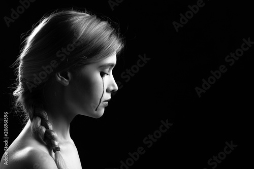 Leinwand Poster young woman crying