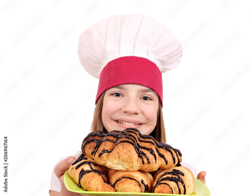 happy little girl cook and tasty croissant with chocolate happy little girl cook and tasty croissant with chocolate