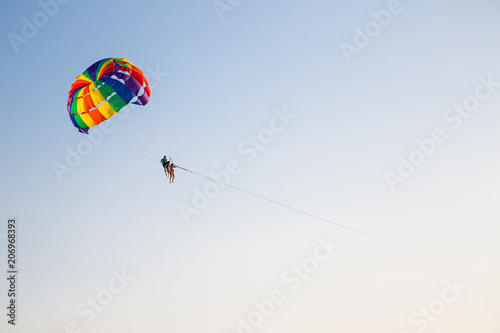 Paraseyling. Beautiful flight with a parachute over the sea at sunset. Thailand. Active rest.