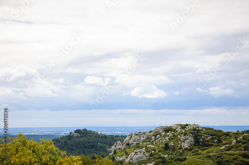 Picturesque view on mountains and valley from Les Baux-de-Provence village in Provence, France.