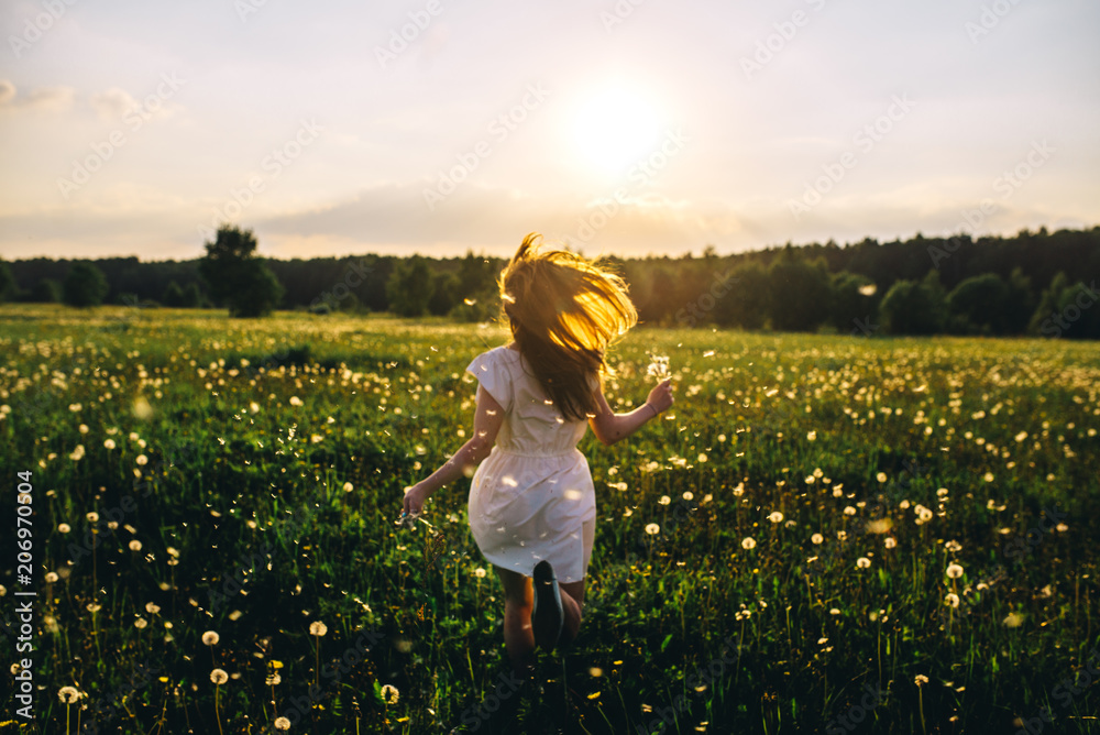 © Kirill - girl at sunset in field