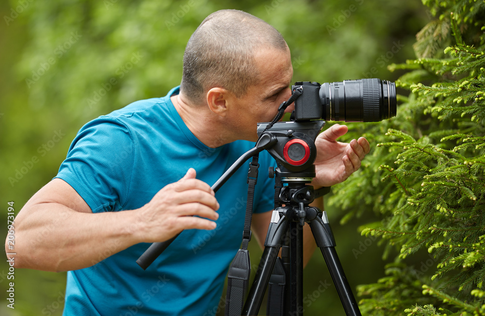 Photographer shooting a macro scene