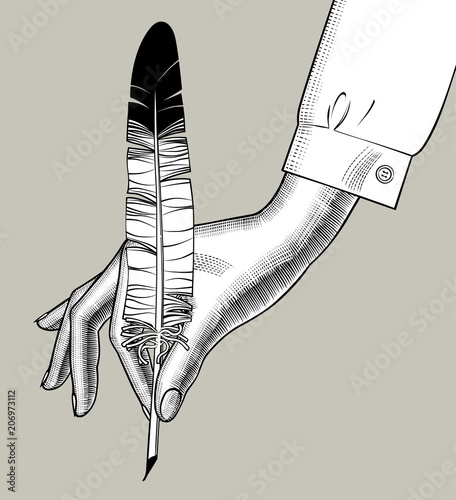 Woman's hands holding a feather pen