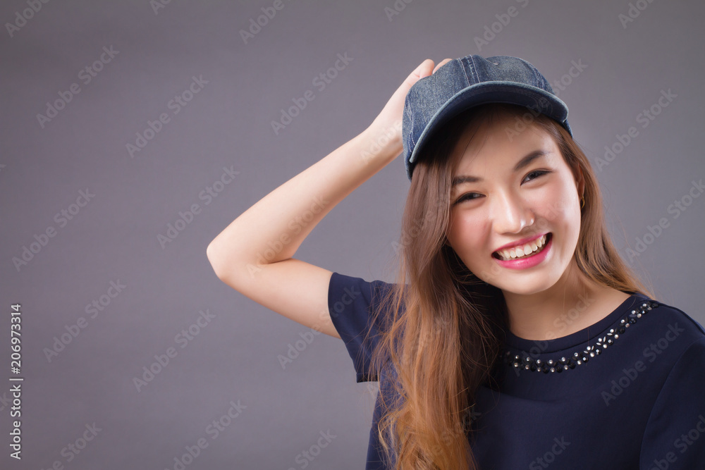 happy asian girl with smiling woman face; portrait of happy, smiling, joyful, cheerful asian woman in casual dress studio isolated; asian chinese young adult woman model happy asian girl with smiling woman face; portrait of happy, smiling, joyful, cheerful asian woman in casual dress studio isolated; asian chinese young adult woman model
