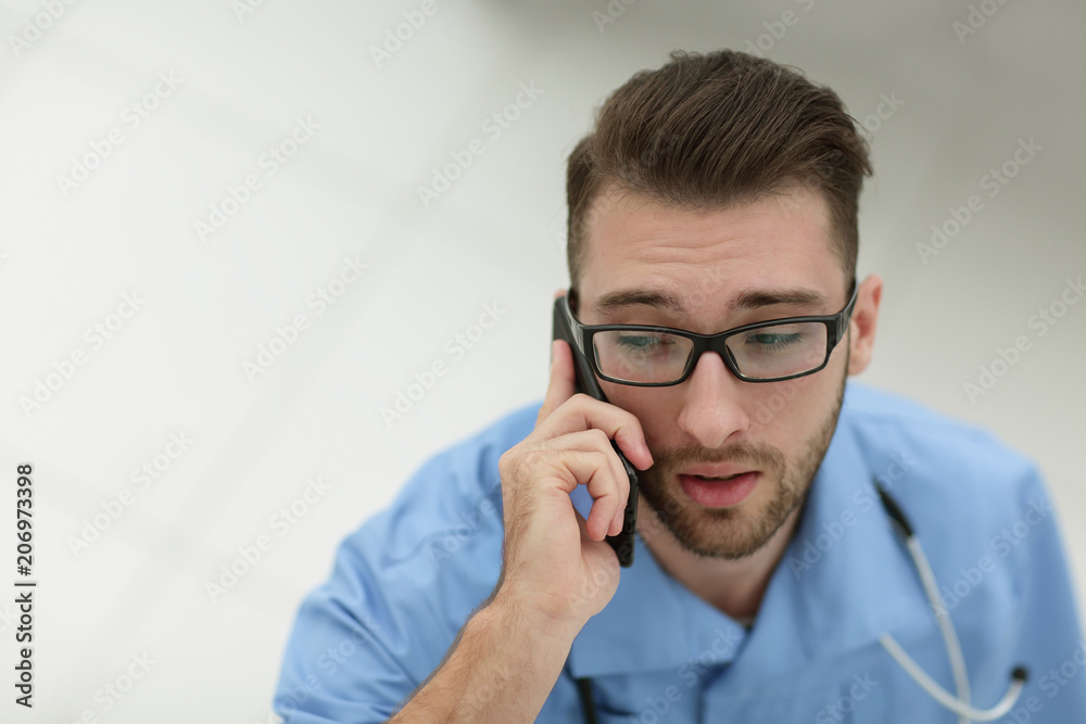 doctor speaking on the phone doctor speaking on the phone