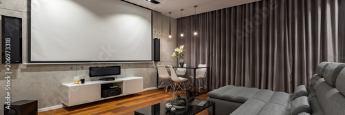 Bild auf Leinwand Narrow sofa and projector screen