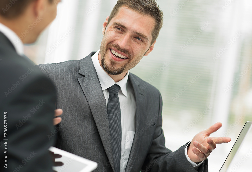 closeup.business partners discussing business issues closeup.business partners discussing business issues