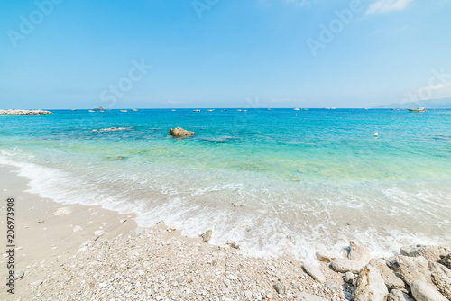 White pebbles and turquoise water in Marina Grande beach