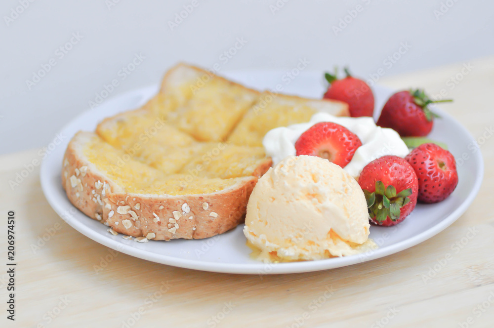 toast or bread with butter topping and ice cream toast or bread with butter topping and ice cream