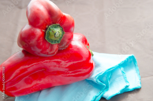 red peppers, on table with brown tablecloth