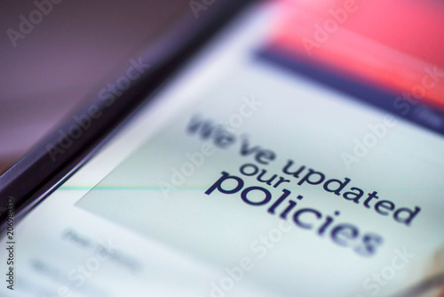 General Data Protection Regulation - GDPR - closeup smartphone message We've Updated Our Policies photo