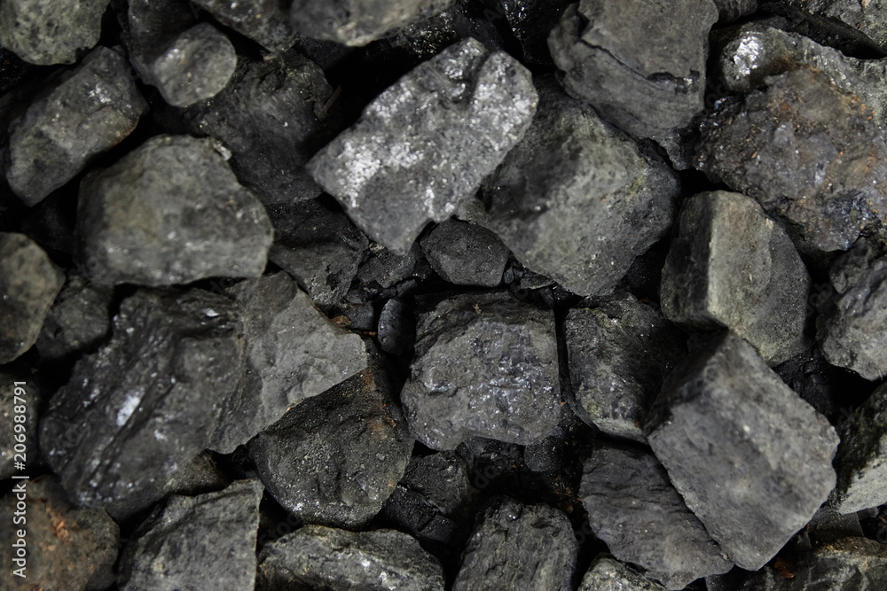 Black coal background or texture. Top view. Coal mining concept. Black coal background or texture. Top view. Coal mining concept.