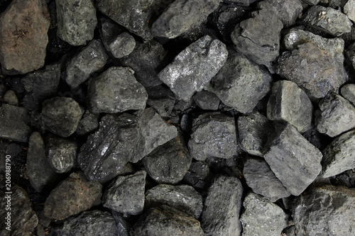 Black coal background or texture. Top view. Coal mining concept.